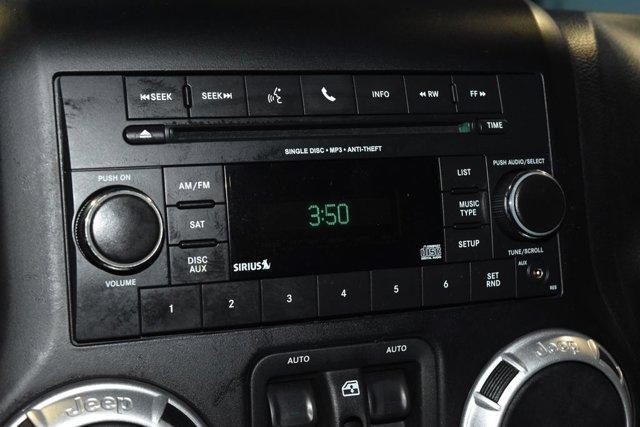 used 2014 Jeep Wrangler Unlimited car, priced at $16,240