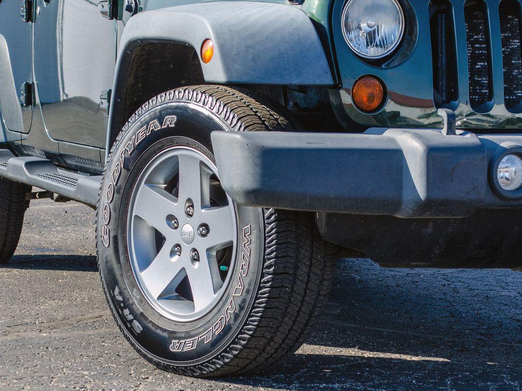 used 2011 Jeep Wrangler Unlimited car, priced at $12,989