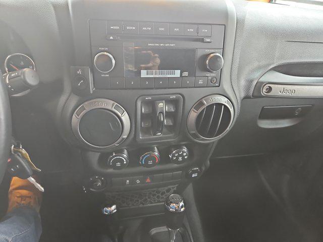 used 2015 Jeep Wrangler Unlimited car, priced at $27,495