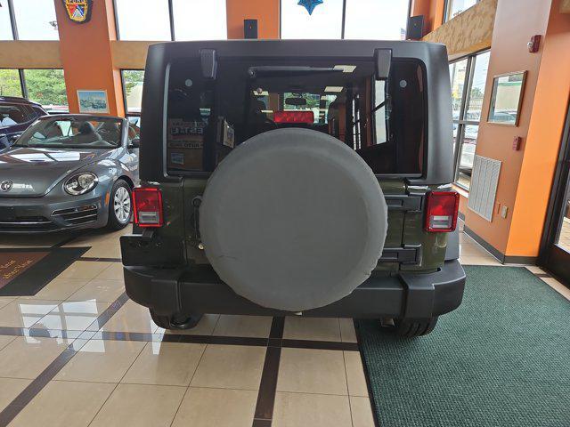 used 2015 Jeep Wrangler Unlimited car, priced at $27,495