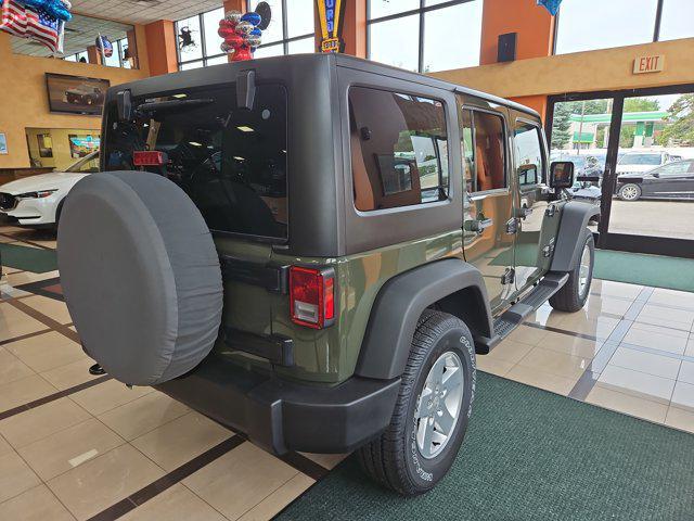 used 2015 Jeep Wrangler Unlimited car, priced at $27,495