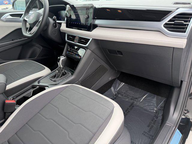 used 2025 Volkswagen Taos car, priced at $22,991