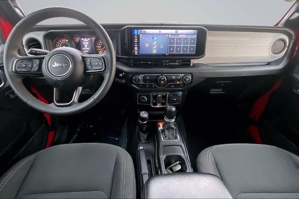used 2024 Jeep Wrangler car, priced at $30,728