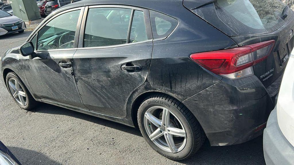 used 2023 Subaru Impreza car, priced at $17,995