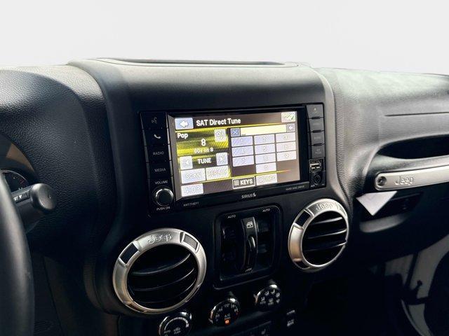 used 2017 Jeep Wrangler Unlimited car, priced at $23,571