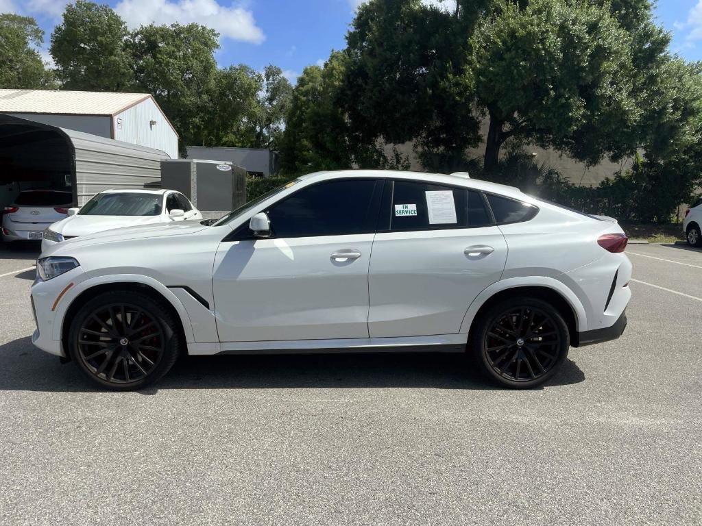 used 2023 BMW X6 car, priced at $65,628