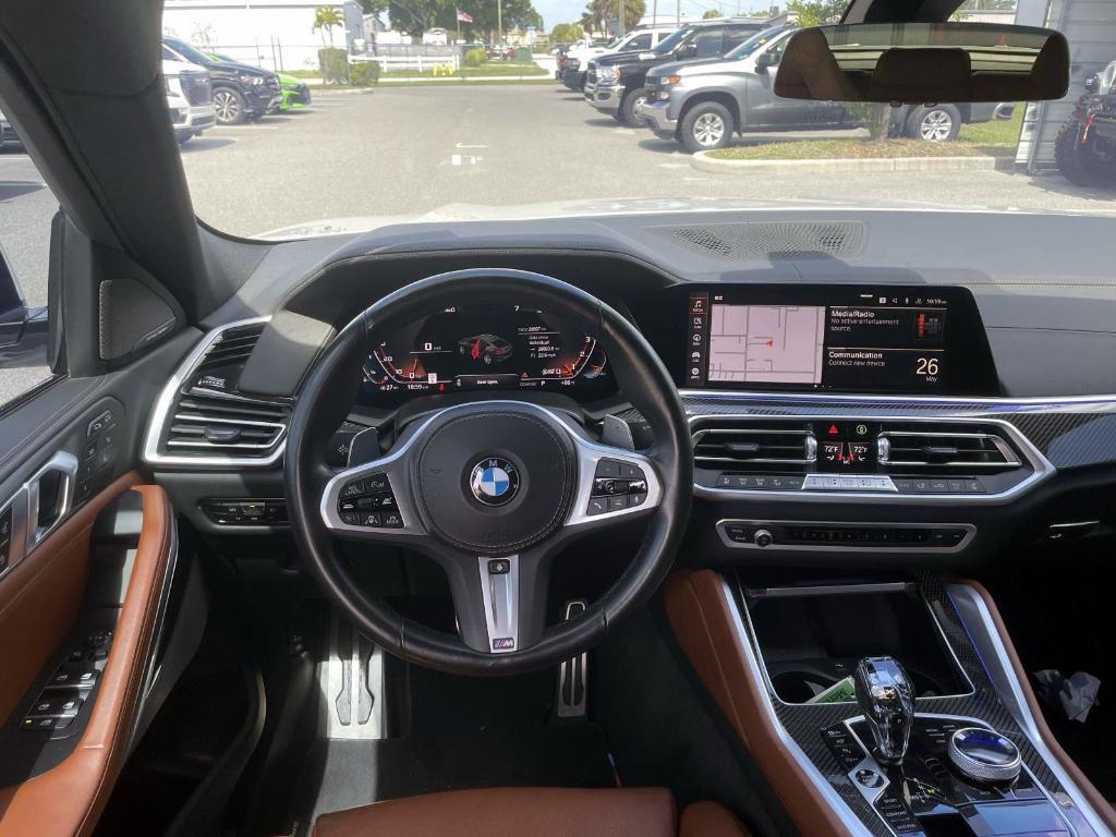 used 2023 BMW X6 car, priced at $65,628