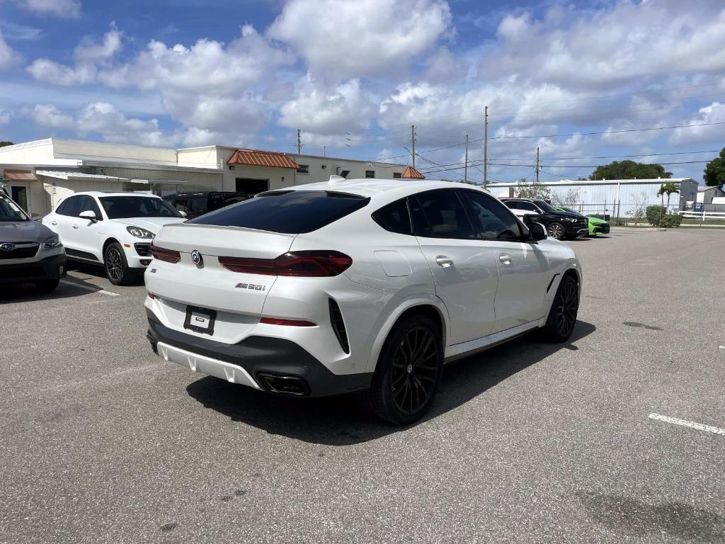 used 2023 BMW X6 car, priced at $65,628