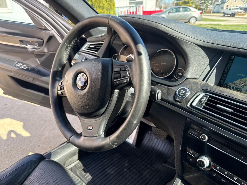used 2014 BMW 740 car, priced at $7,990