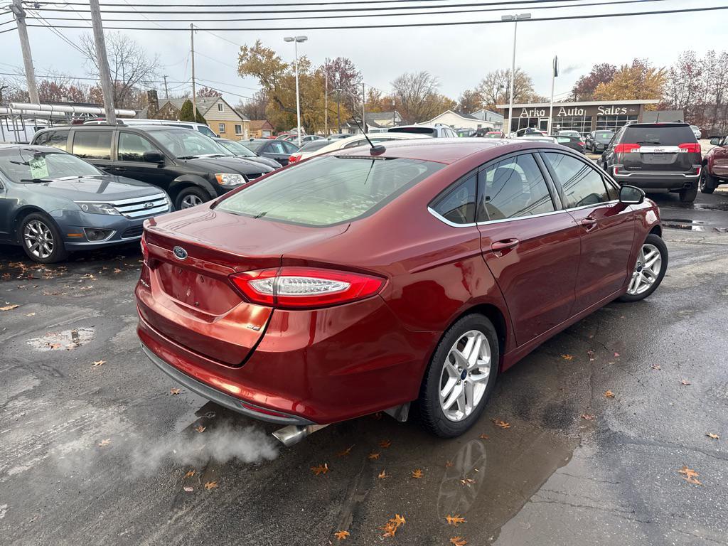 used 2014 Ford Fusion car, priced at $3,990