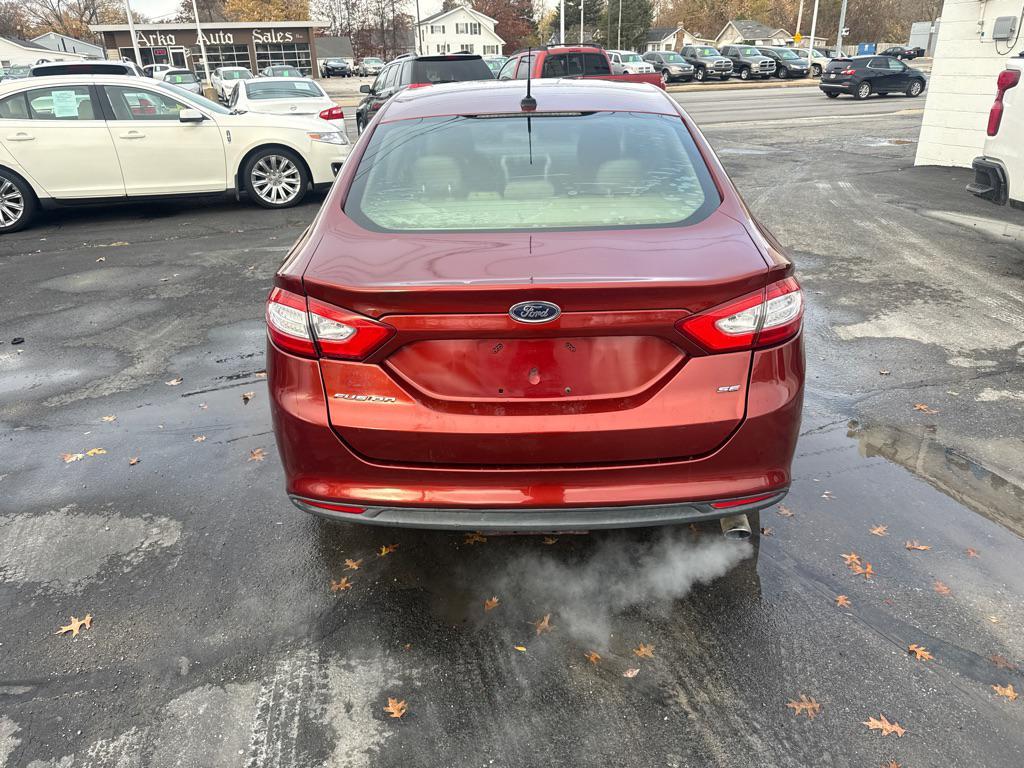 used 2014 Ford Fusion car, priced at $3,990