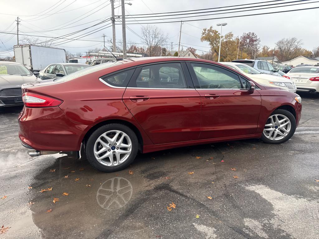 used 2014 Ford Fusion car, priced at $3,990