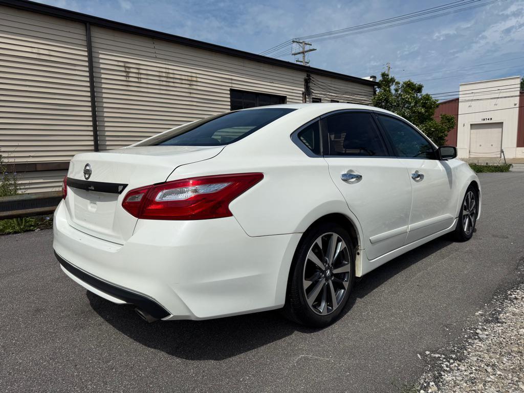 used 2016 Nissan Altima car, priced at $6,990