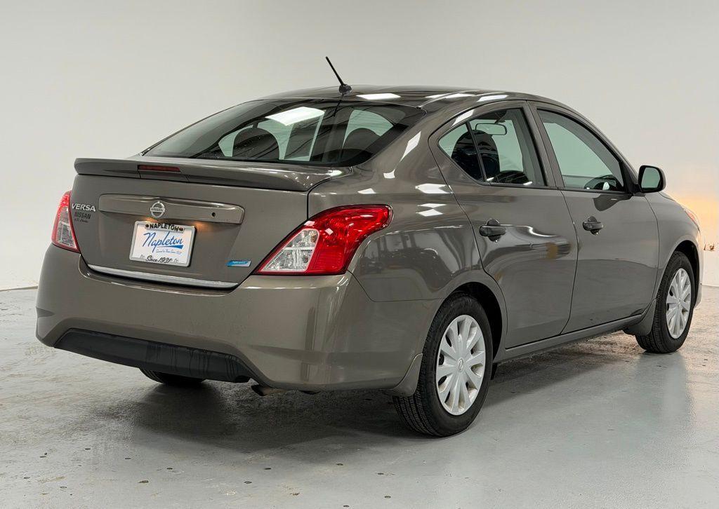 used 2015 Nissan Versa car, priced at $6,500