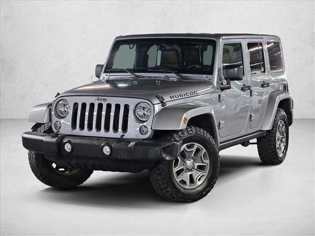 used 2015 Jeep Wrangler Unlimited car, priced at $19,496