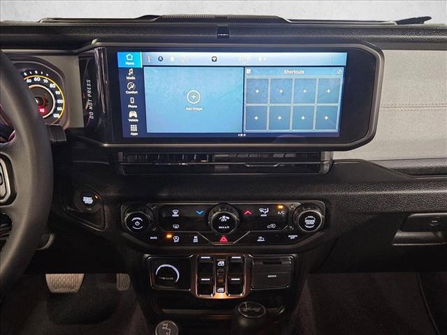 used 2024 Jeep Wrangler car, priced at $33,589