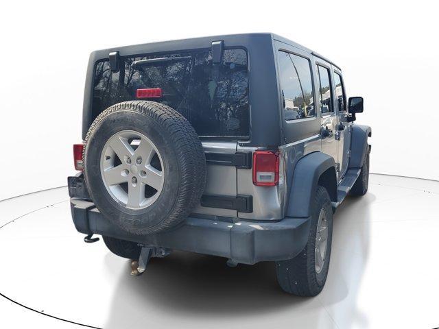used 2016 Jeep Wrangler Unlimited car, priced at $16,359