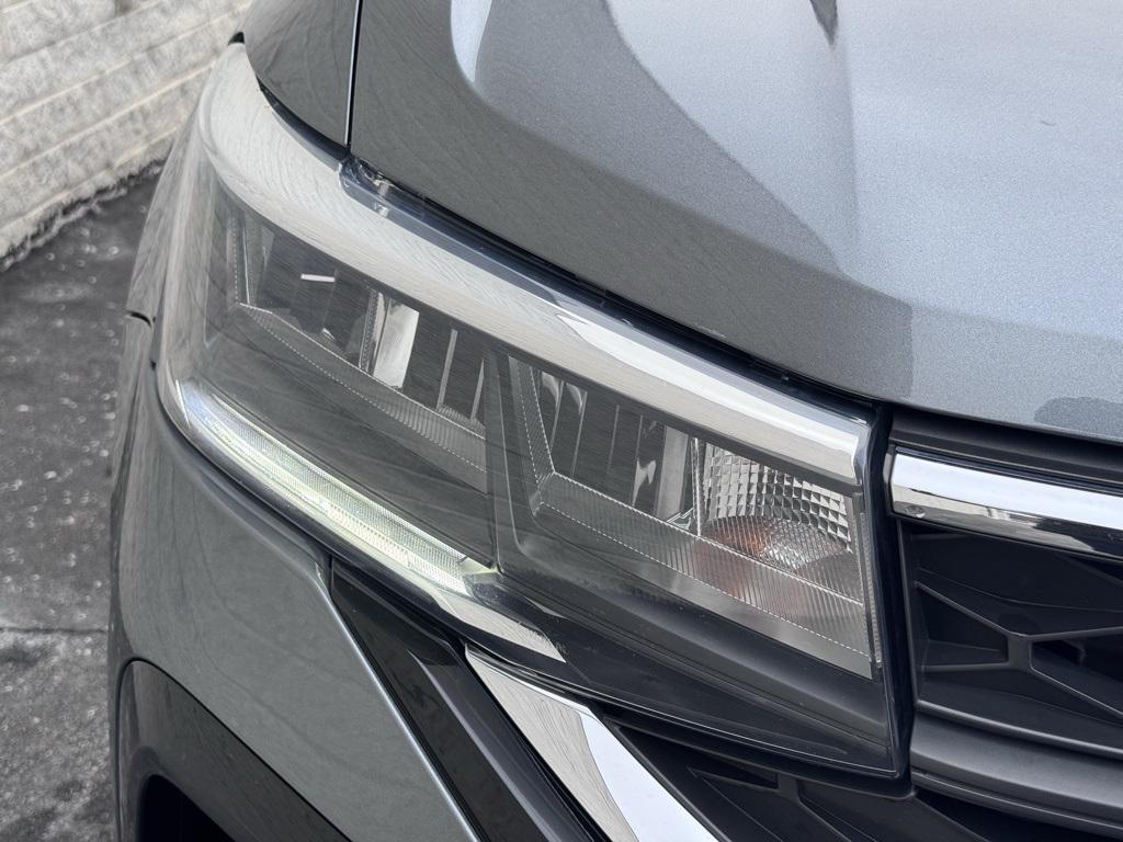 used 2022 Volkswagen Taos car, priced at $16,971