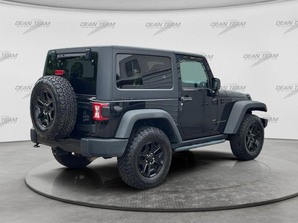 used 2014 Jeep Wrangler car, priced at $17,094