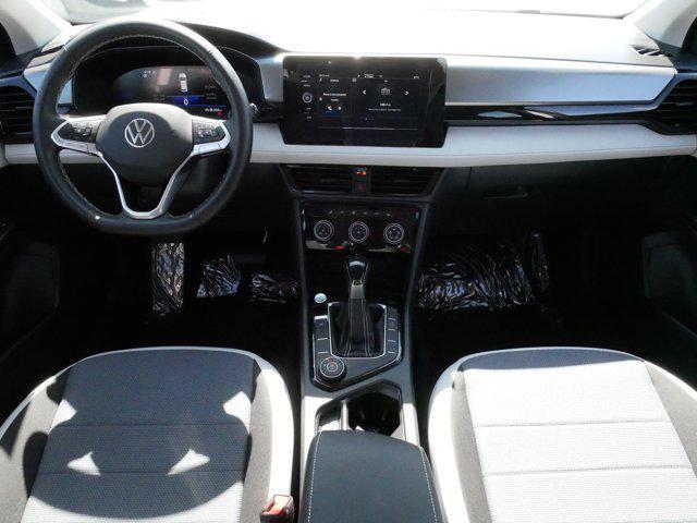 used 2025 Volkswagen Taos car, priced at $25,345