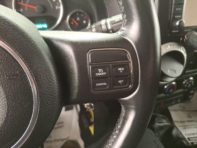 used 2013 Jeep Wrangler Unlimited car, priced at $15,450