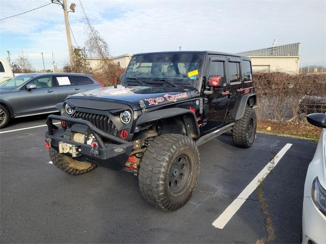used 2013 Jeep Wrangler Unlimited car, priced at $16,485