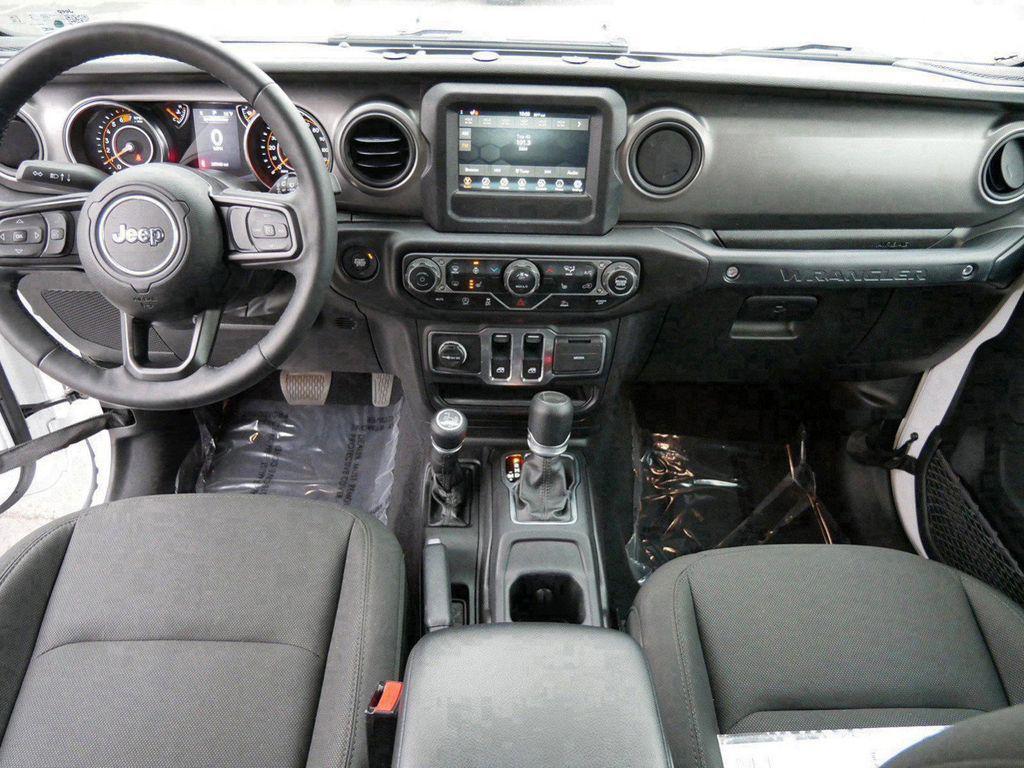 used 2023 Jeep Wrangler car, priced at $27,987
