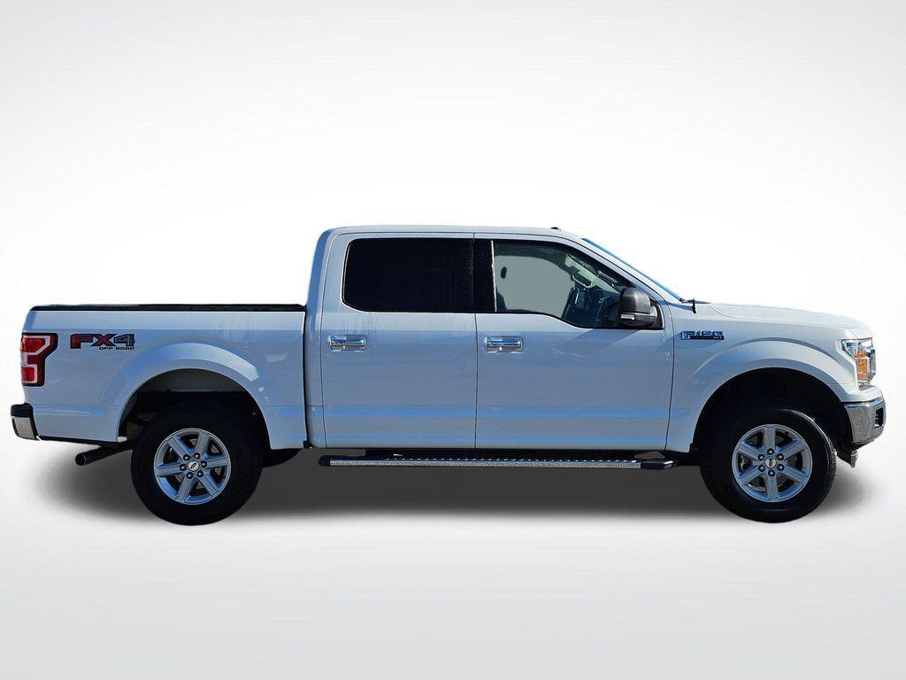 used 2018 Ford F-150 car, priced at $15,000