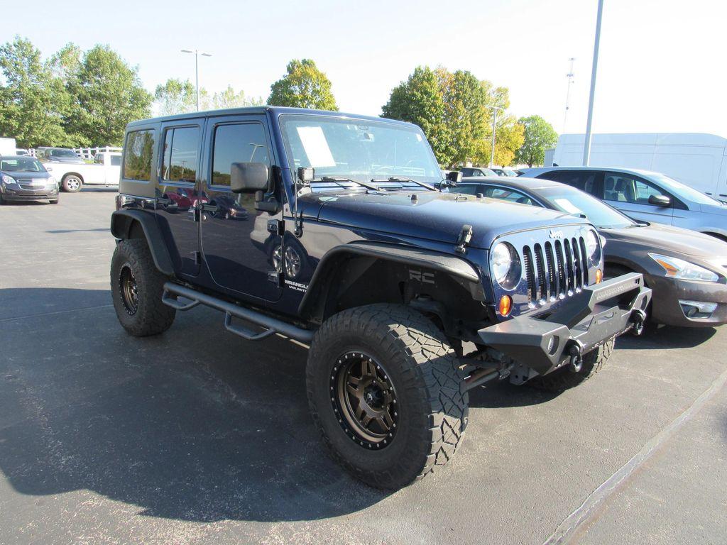 used 2013 Jeep Wrangler Unlimited car, priced at $16,895