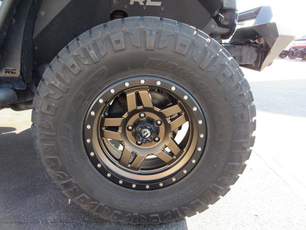 used 2013 Jeep Wrangler Unlimited car, priced at $16,895