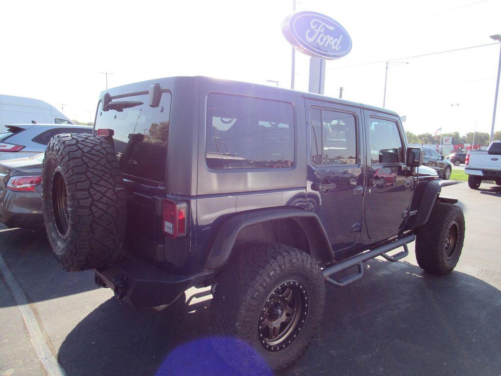 used 2013 Jeep Wrangler Unlimited car, priced at $16,895