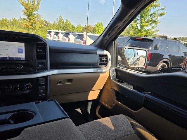 used 2023 Ford F-150 car, priced at $34,103