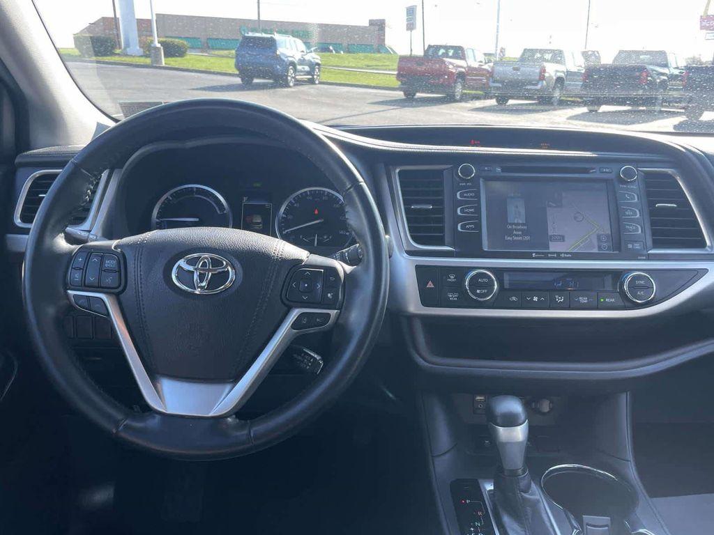 used 2019 Toyota Highlander Hybrid car, priced at $25,156