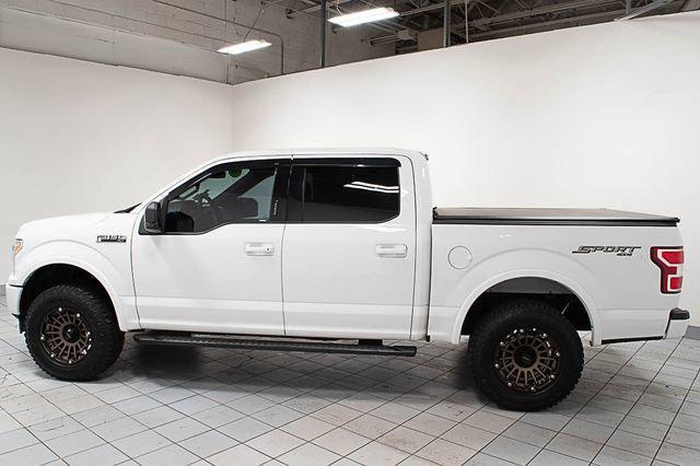 used 2018 Ford F-150 car, priced at $23,864