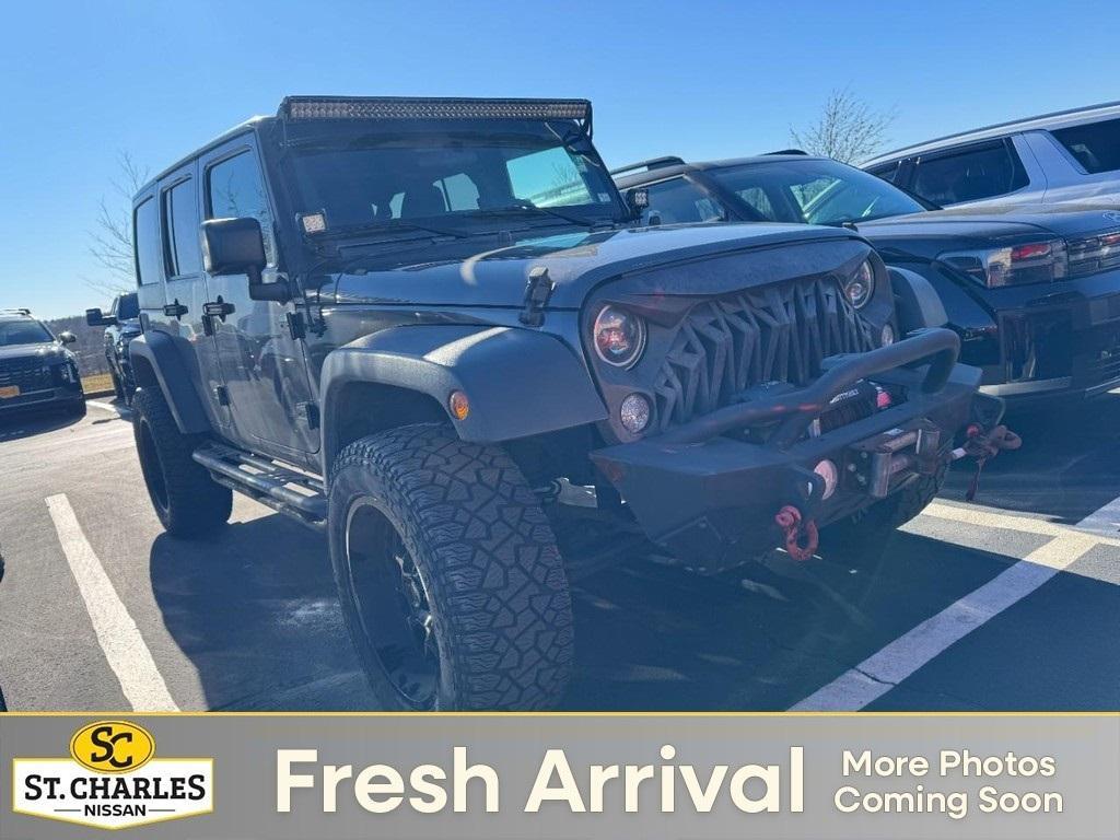 used 2017 Jeep Wrangler Unlimited car, priced at $15,477