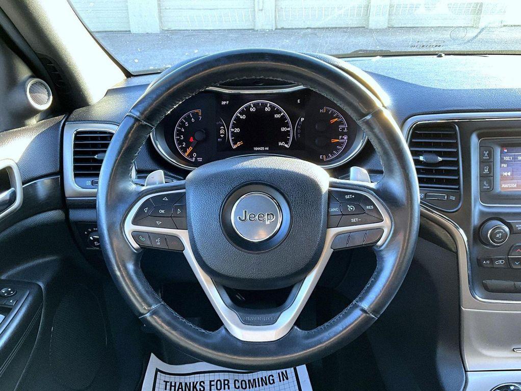 used 2014 Jeep Grand Cherokee car, priced at $10,756