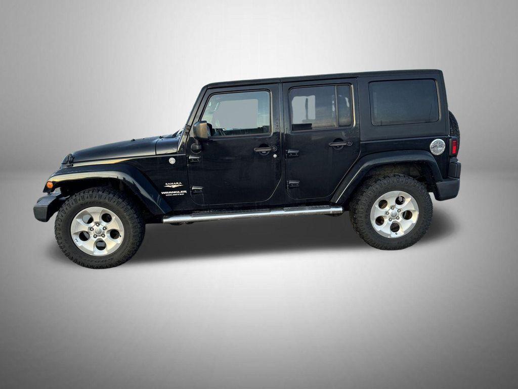 used 2015 Jeep Wrangler Unlimited car, priced at $17,278