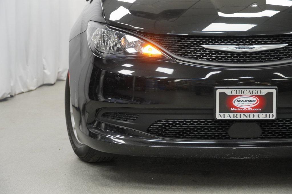 used 2023 Chrysler Voyager car, priced at $23,494