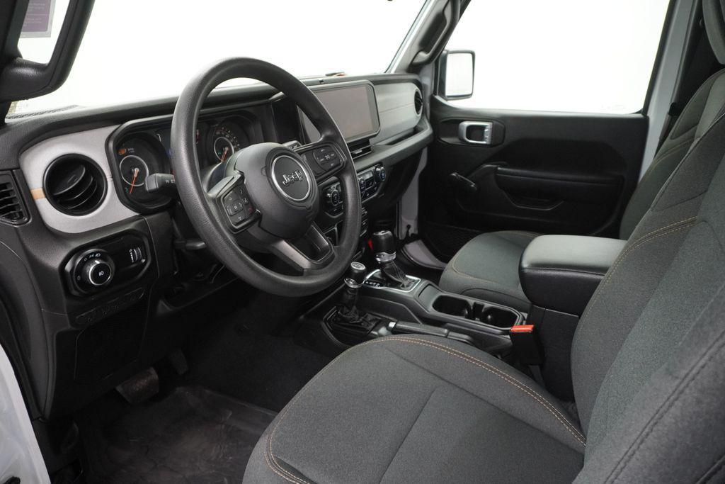 used 2024 Jeep Wrangler car, priced at $33,794