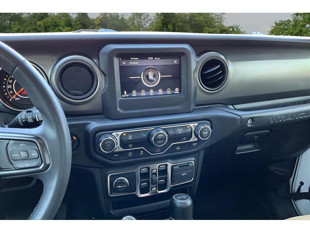 used 2023 Jeep Wrangler car, priced at $26,470