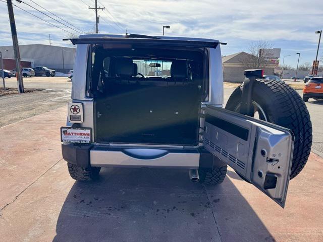 used 2016 Jeep Wrangler Unlimited car, priced at $19,471