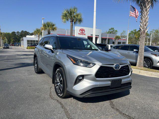 used 2022 Toyota Highlander Hybrid car, priced at $29,998