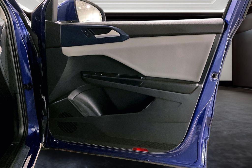 used 2023 Volkswagen Taos car, priced at $16,623