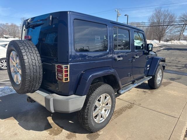 used 2013 Jeep Wrangler Unlimited car, priced at $11,769