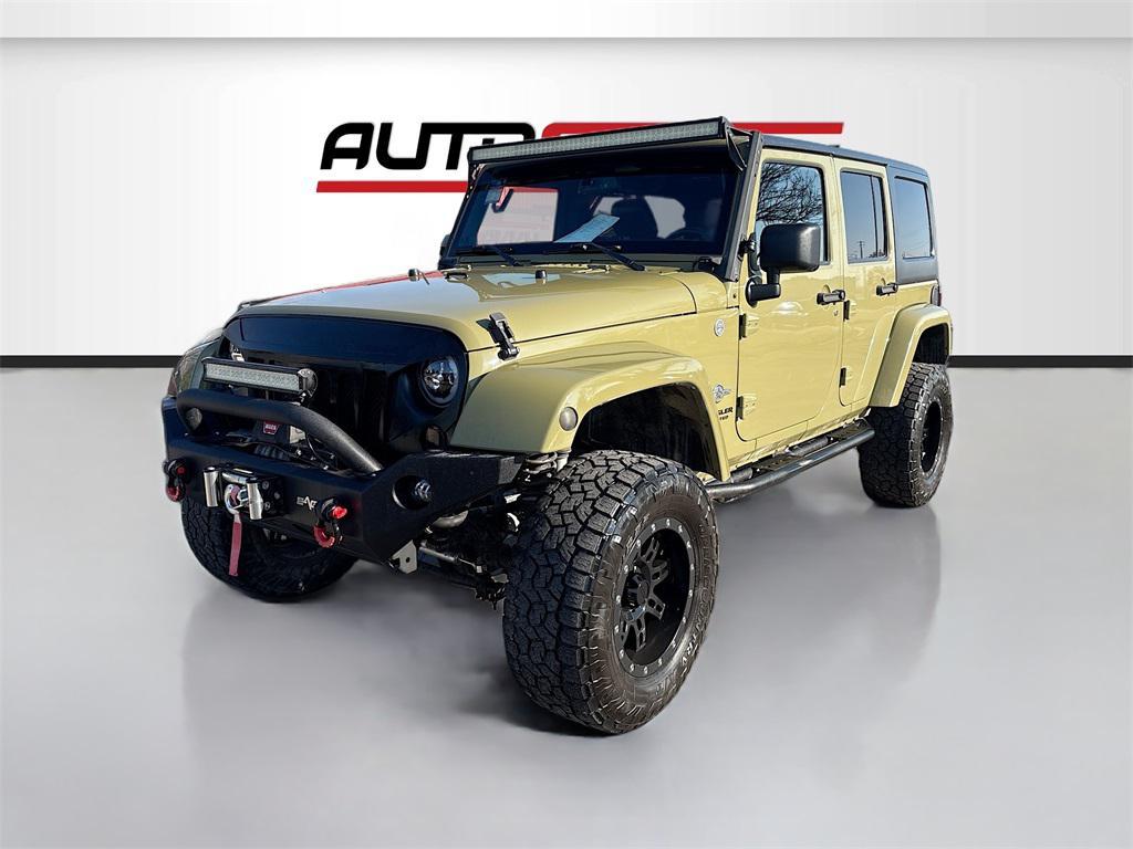 used 2013 Jeep Wrangler Unlimited car, priced at $17,500