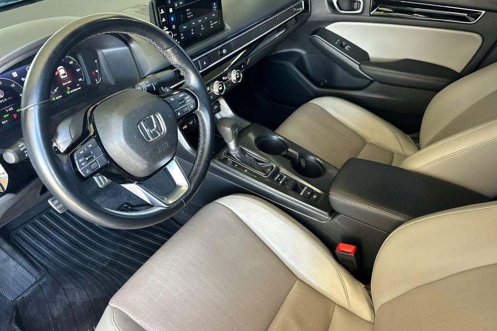used 2025 Honda Civic Hybrid car, priced at $27,595