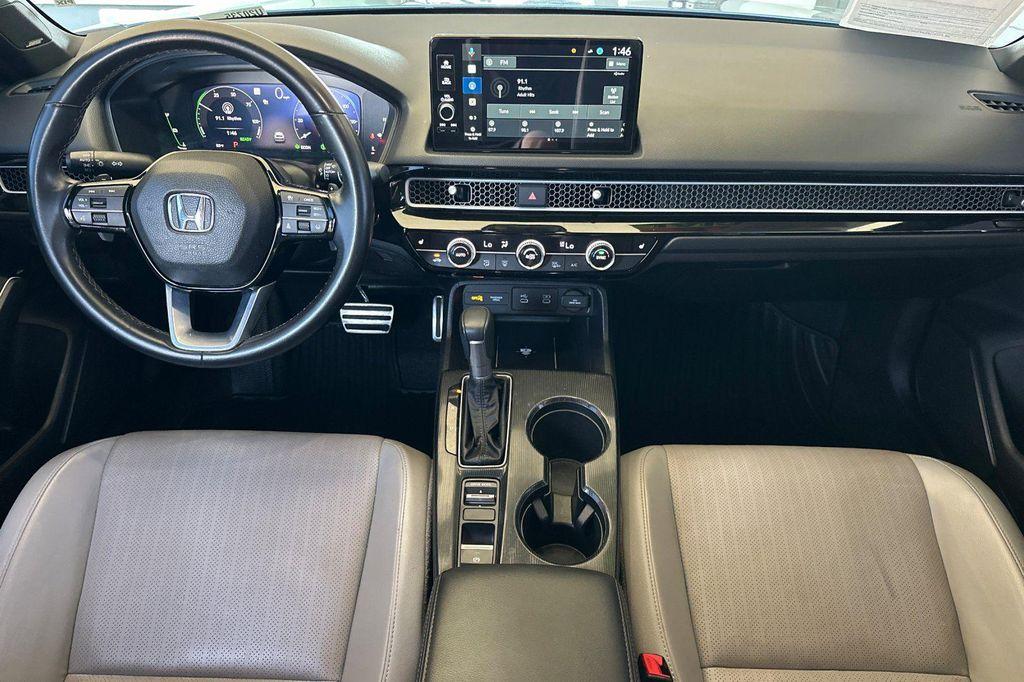 used 2025 Honda Civic Hybrid car, priced at $27,595
