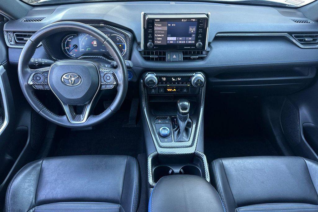 used 2021 Toyota RAV4 Hybrid car, priced at $27,495