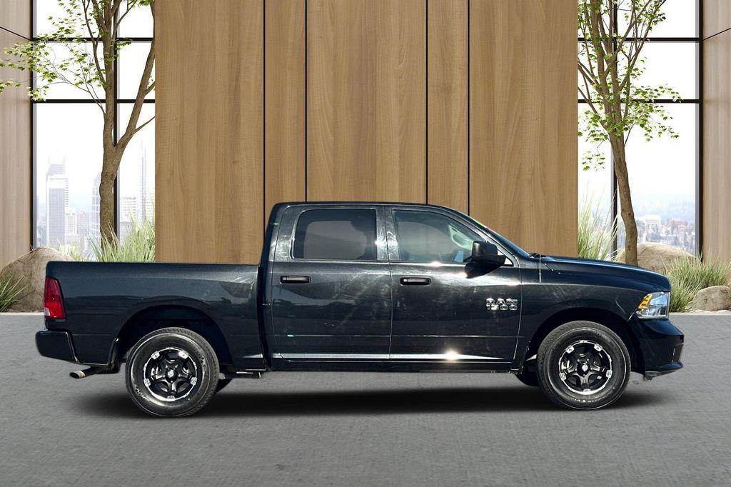 used 2018 Ram 1500 car, priced at $19,260