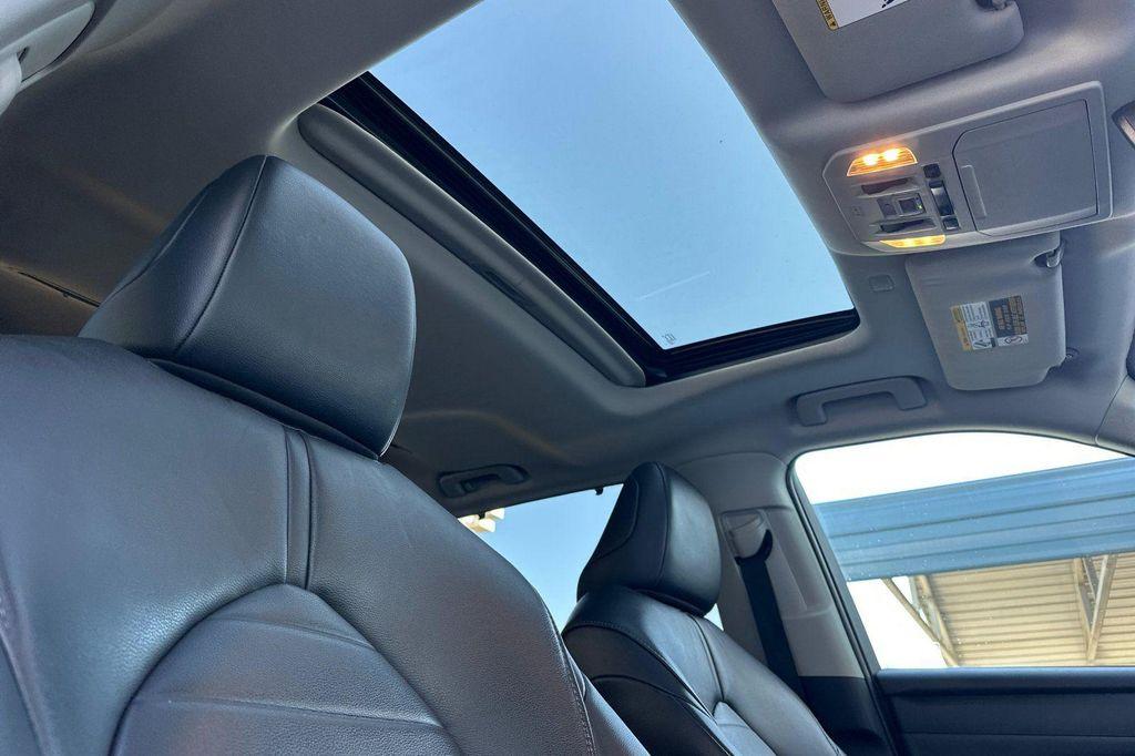 used 2020 Toyota Highlander Hybrid car, priced at $29,395